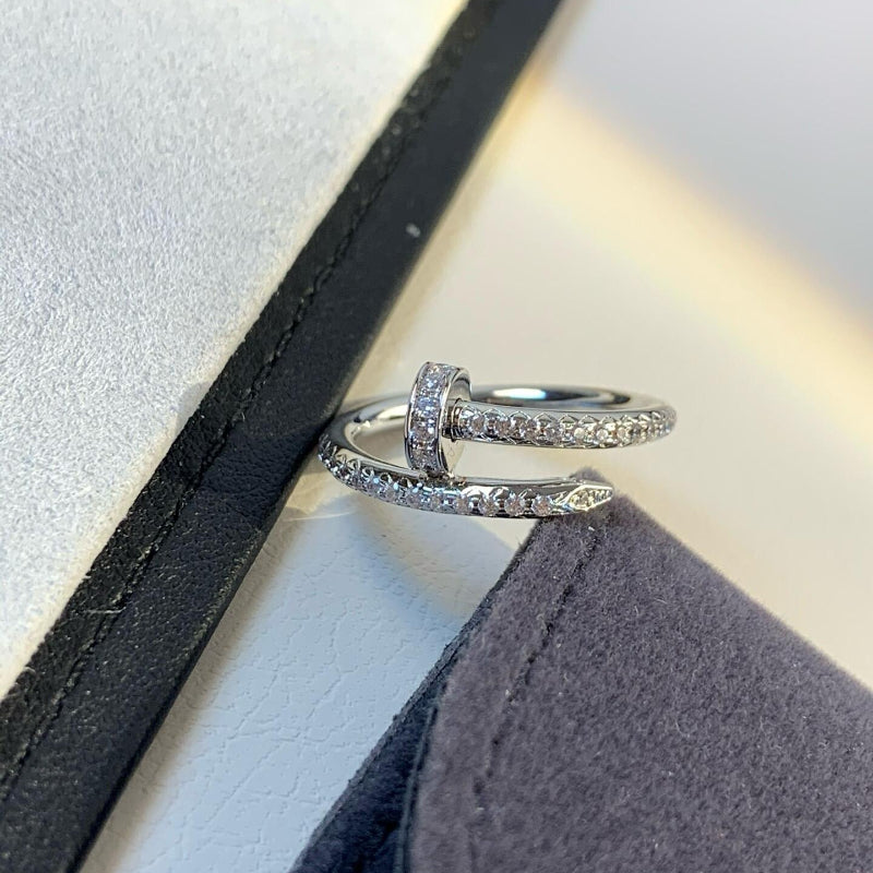white gold nail ring small model half paved with diamonds