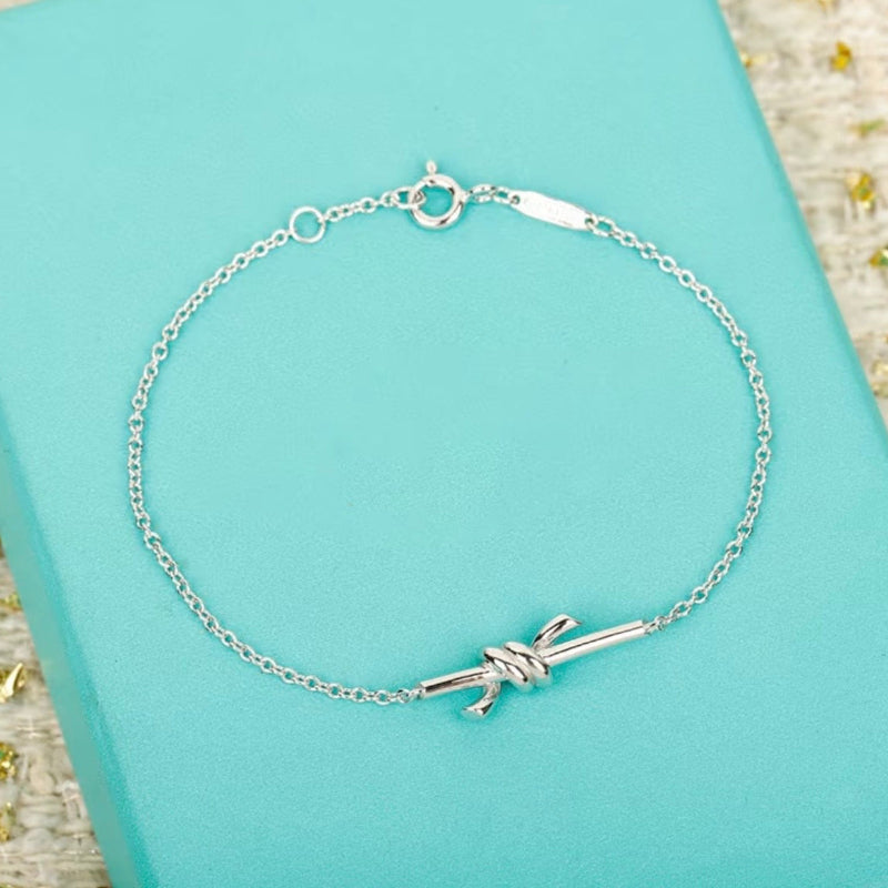 white gold knot style chain bracelet