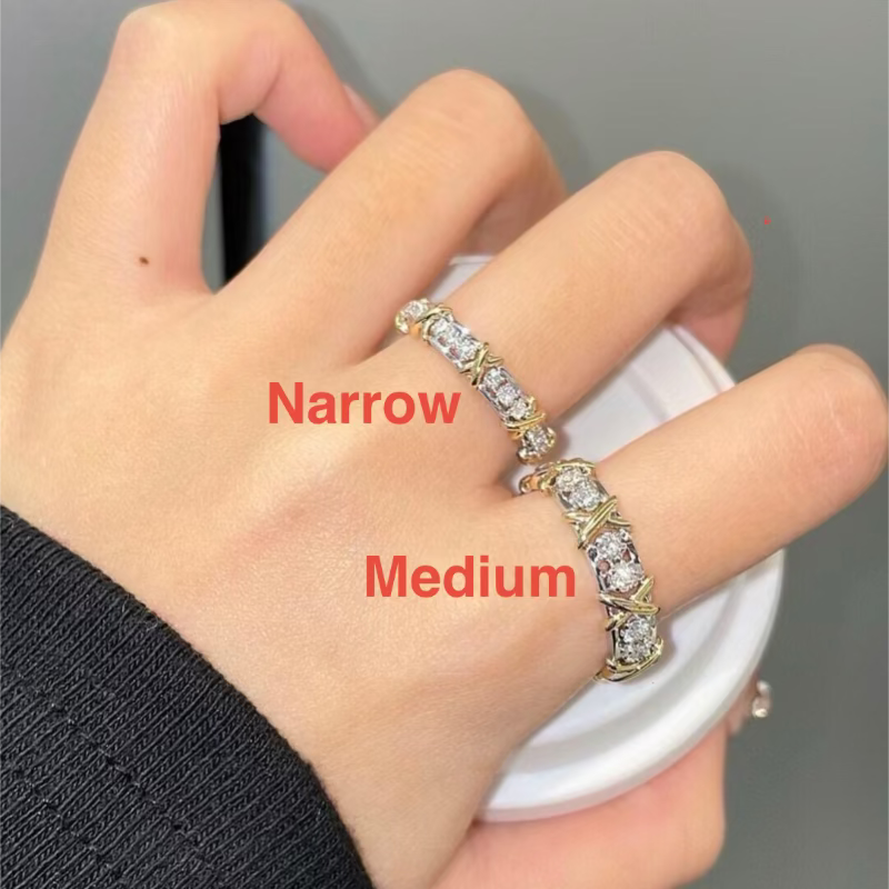 woman wearing sixteen stone style diamond ring on finger