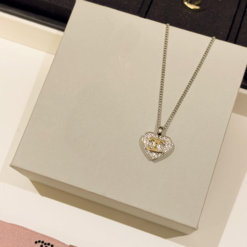 close up of full crystal pave heart pendant on 26P silver necklace