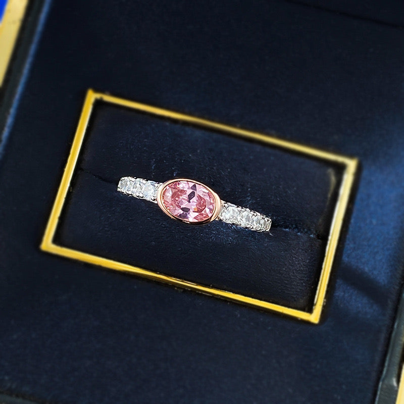 Anillo ovalado de plata de ley 925 con zafiro rosa melocotón de 5 x 7 mm de CrownJewel