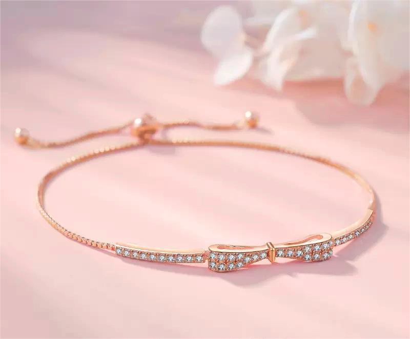 CrownJewel S925 sterling silver bow bracelet for women, simple and fashionable full diamond zircon micro diamond pull-out bracelet