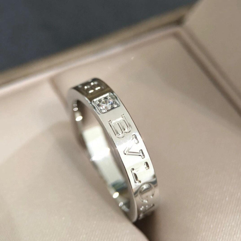 close up of white gold B.zero1 style ring with single crystal stone spiral design