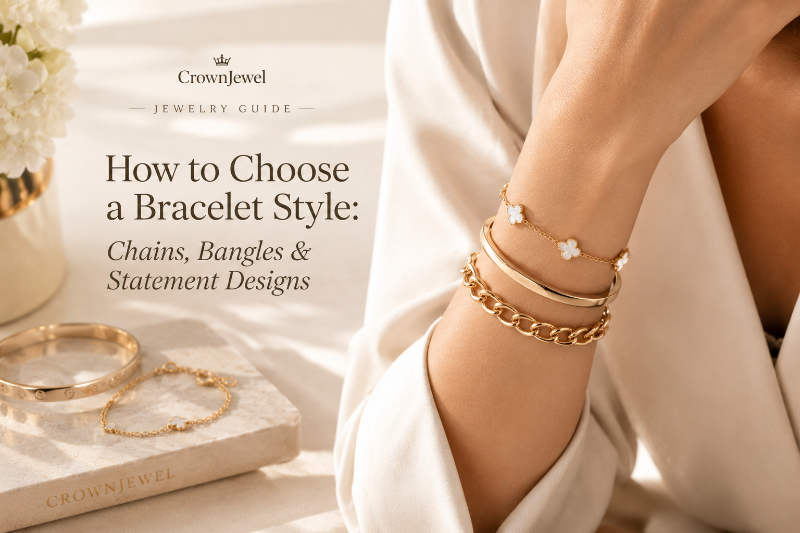 Gold chain bracelet, smooth bangle and charm bracelet styled together in a luxury jewelry editorial