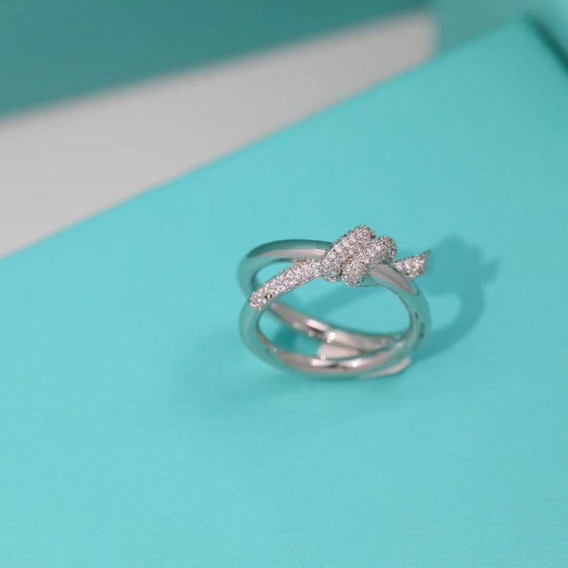 white gold knot style double row crystal pave ring