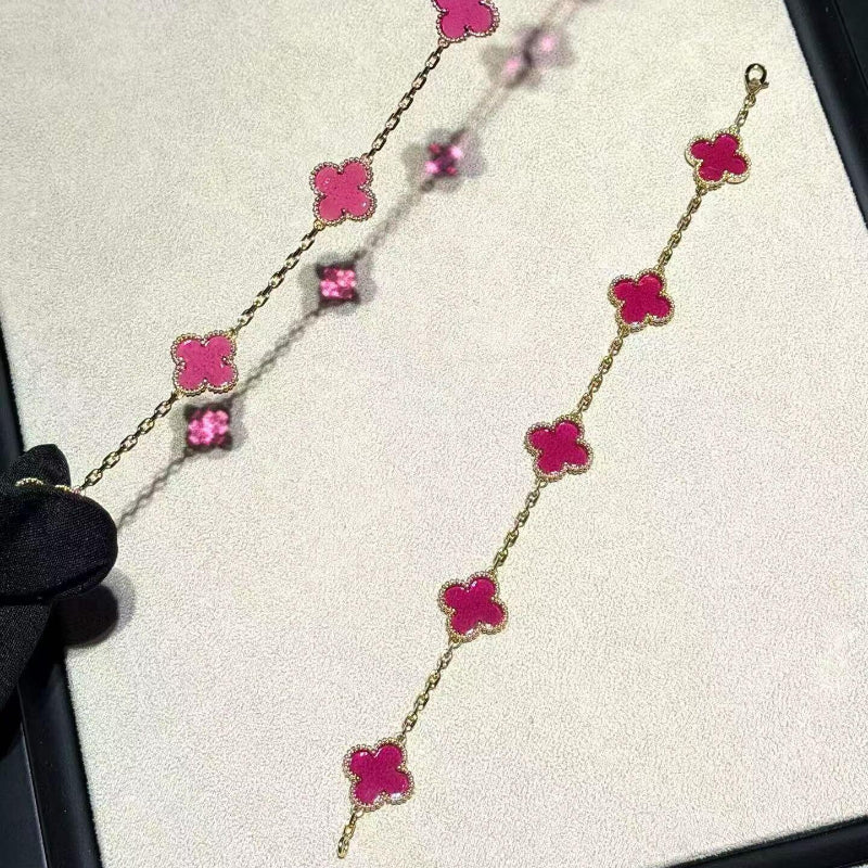 18k yellow gold pink enamel 5 motif bracelet