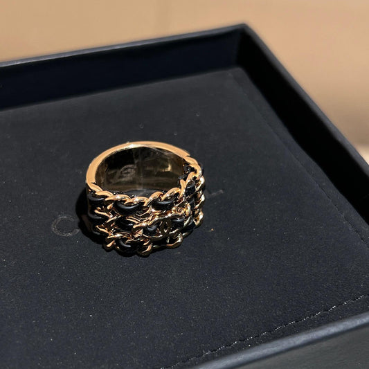 26P style CC black leather woven triple-row ring on white background