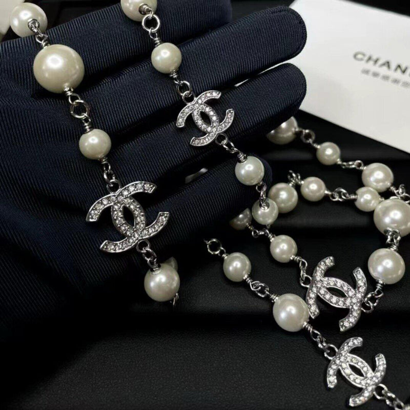 crystal pave CC side of double sided pearl necklace