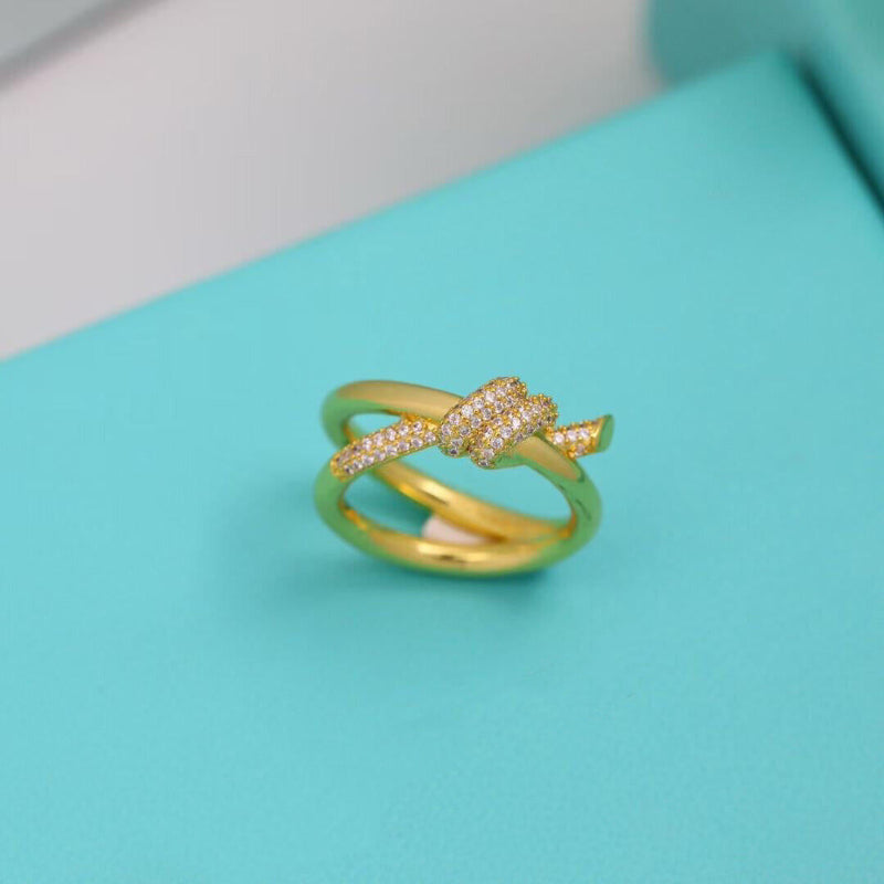 yellow gold knot style double row crystal pave ring