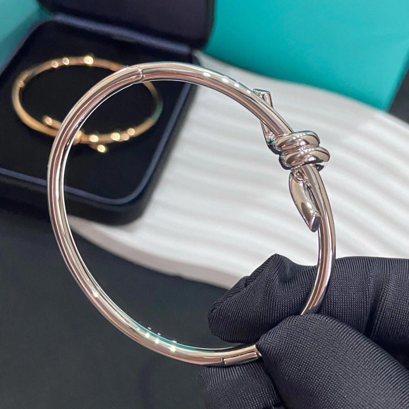 white gold knot style wire bangle