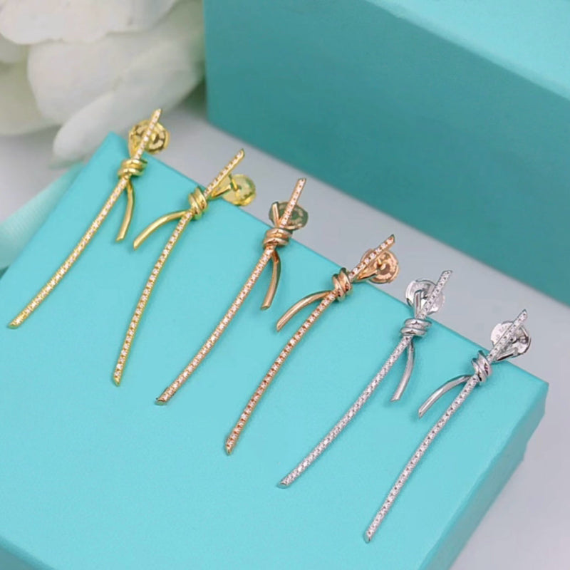 knot style drop earrings with crystal pave 18K gold plated