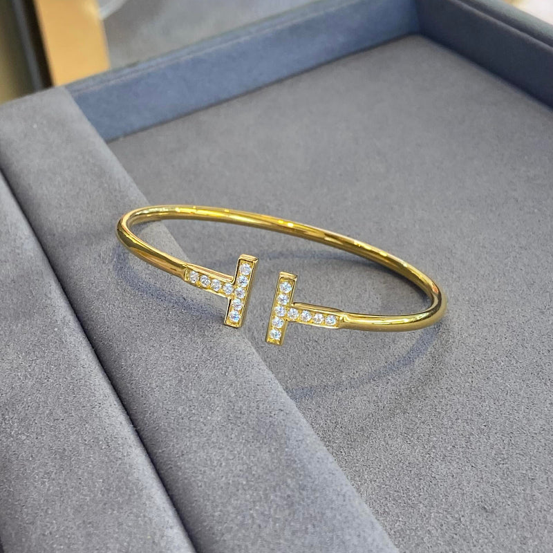 yellow gold T style diamond wire bracelet