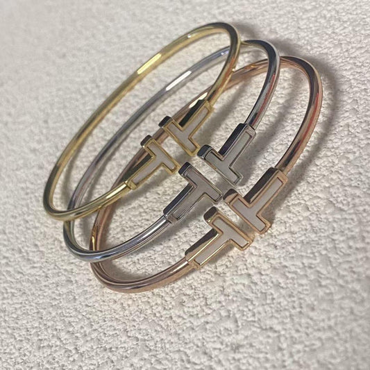 T style mother of pearl wire bracelet 18K gold plated