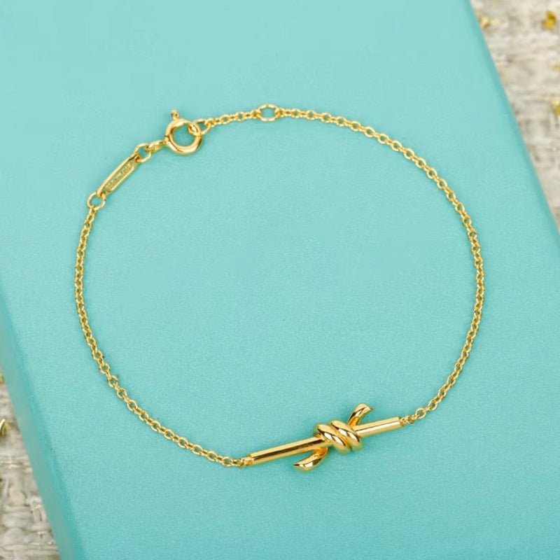 yellow gold knot style chain bracelet