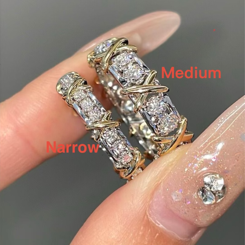close up of alternating diamond and X cross stitch pattern on ring