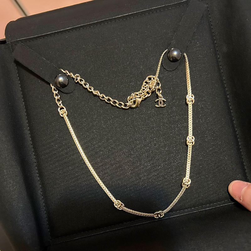 light gold 5 flower snake chain choker with CC logo links