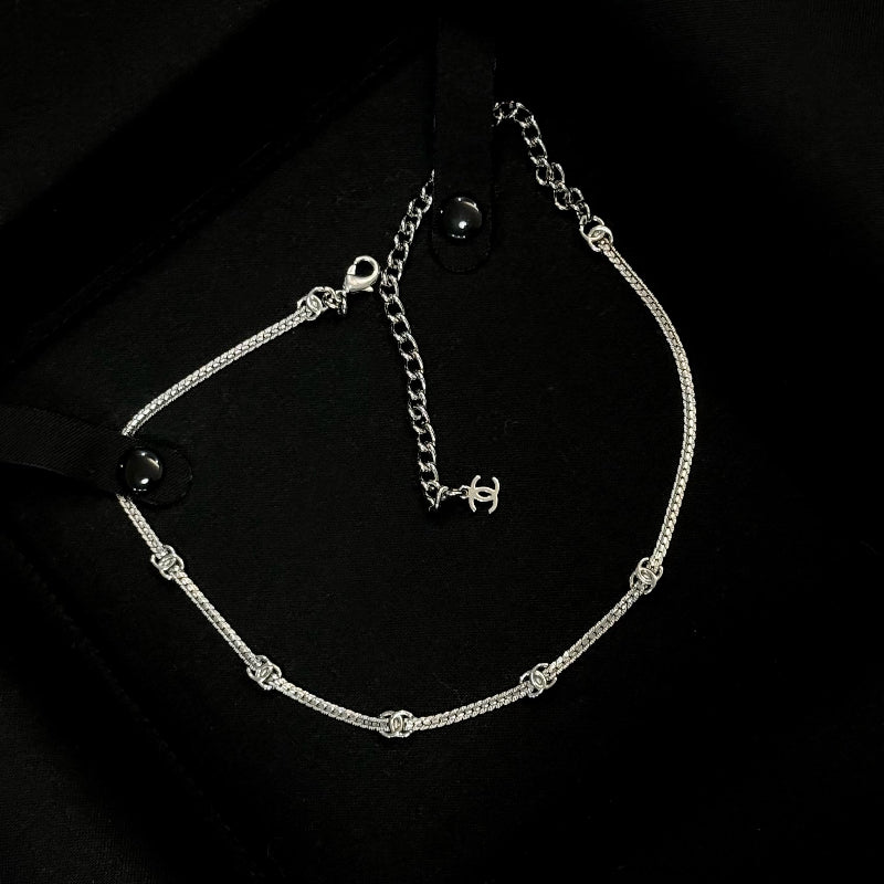 silver 5 flower snake chain choker with CC logo links