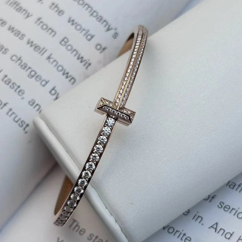 white gold T1 style narrow full pave hinged bangle