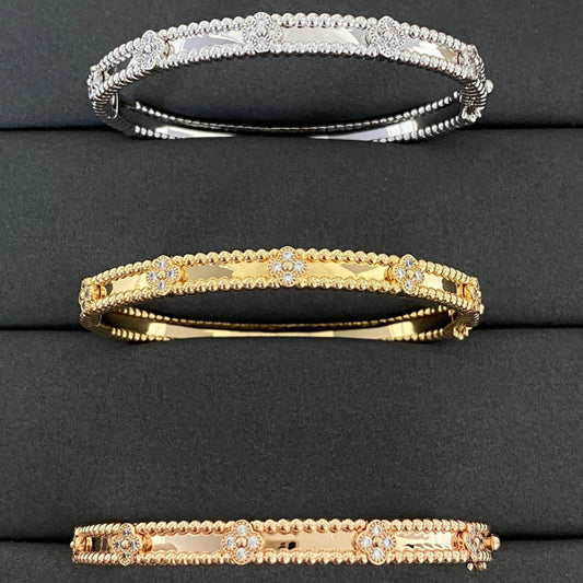 Pulsera de trébol de oro V de 18 quilates